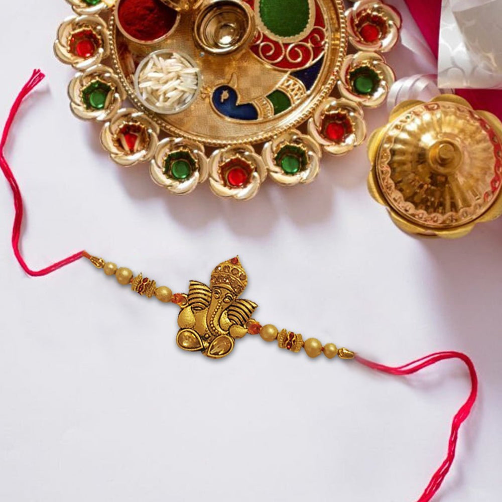 Ganesha Rakhi With Pearls Golden Finish