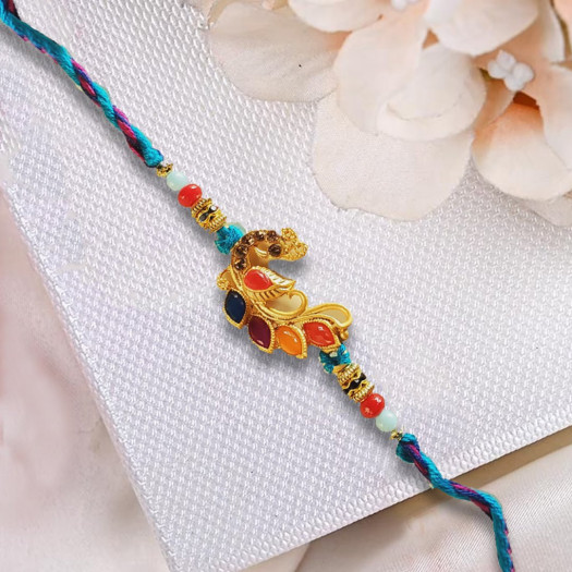 Peacock Shaped Rakhi With Multi Thread