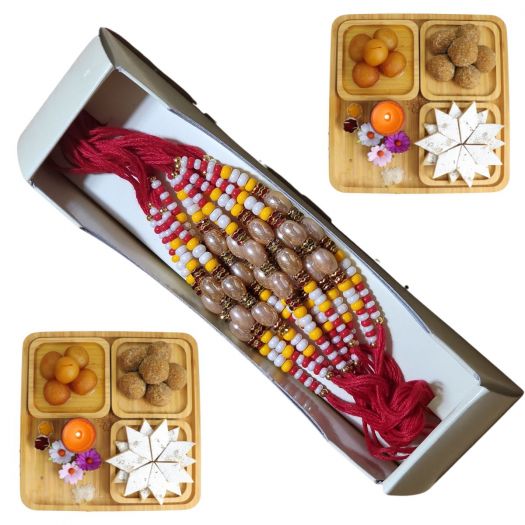 Beautiful Pearl Rakhi With Red Thread