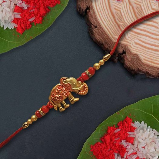 Golden Elephant Rakhi With Red Thread